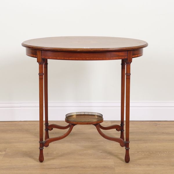 AN EDWARDIAN SATINWOOD INLAID MAHOGANY OVAL TWO TIER OCCASIONAL TABLE