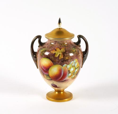 A ROYAL WORCESTER TWO-HANDLED OVOID VASE AND COVER (2)