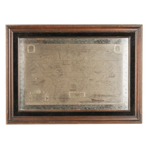 A SILVER FRAMED MAP OF THE WORLD