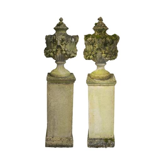 A PAIR OF RECONSTITUTED STONE URN FINIALS (2)