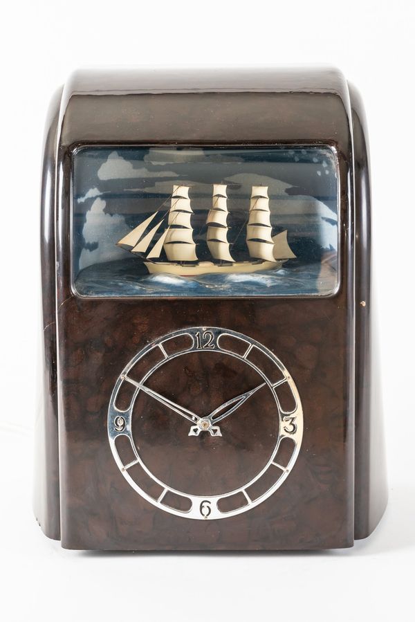 A VITASCOPE INDUSTRIES ELECTRIC DIORAMA CLOCK