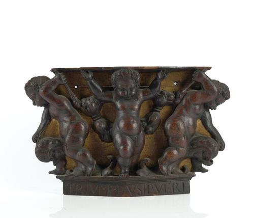 A NORTH EUROPEAN RELIEF CARVED OAK PANEL OF BACCHANALIAN PUTTI