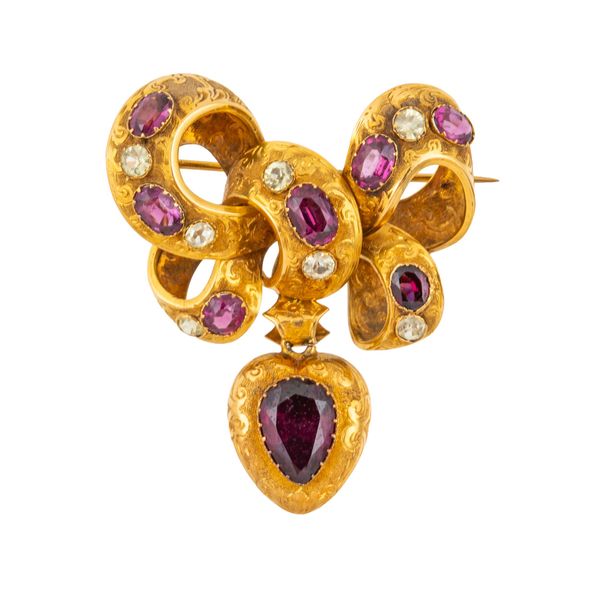 A VICTORIAN CHRYSOBERYL AND GARNET BOW BROOCH