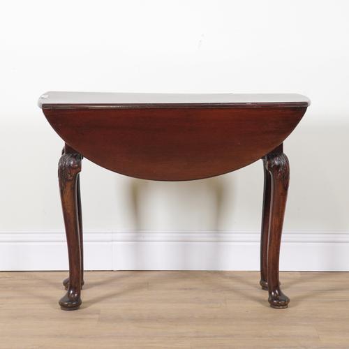 A GEORGE II WALNUT DROP FLAP OVAL TABLE