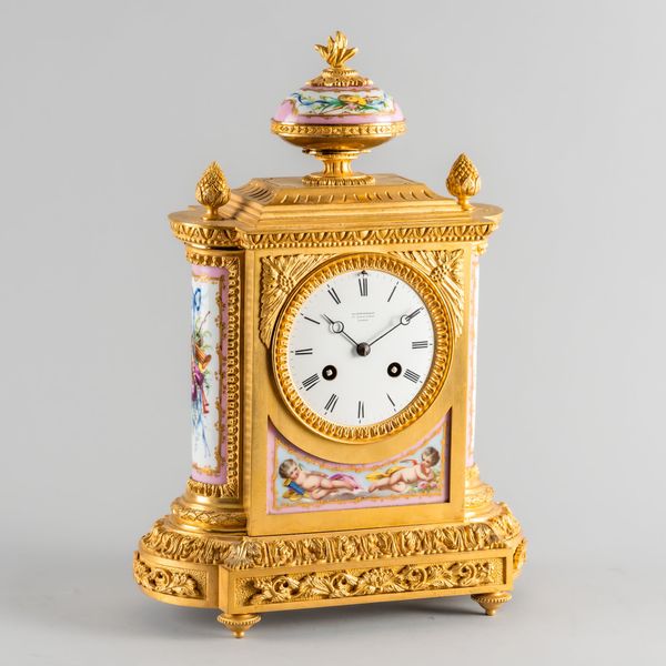 A FRENCH ORMOLU AND PINK SÈVRES-STYLE PORCELAIN MANTEL CLOCK