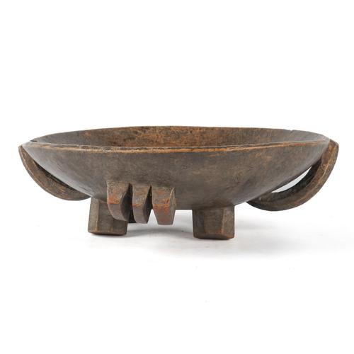 A LARGE HARDWOOD CENTRE DISH OR CEREMONIAL BOWL