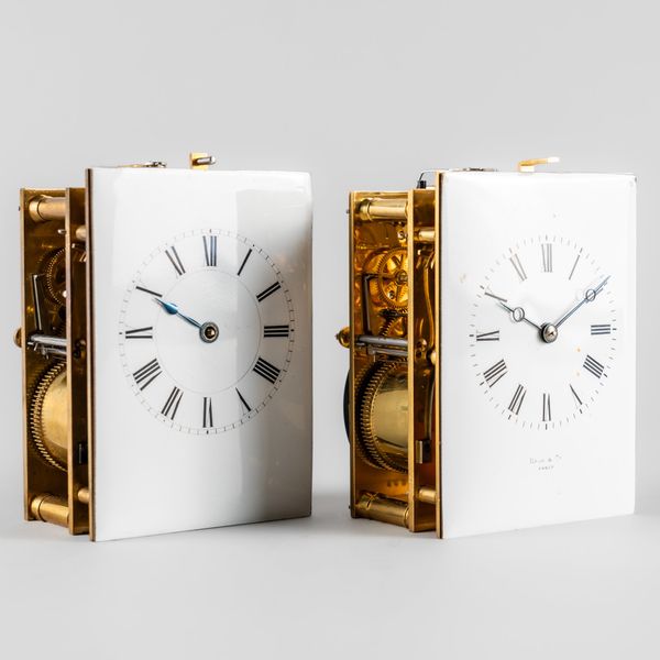 TWO FRENCH STRIKING AND REPEATING CARRIAGE CLOCK MOVEMENTS AND SET OF GLASSES