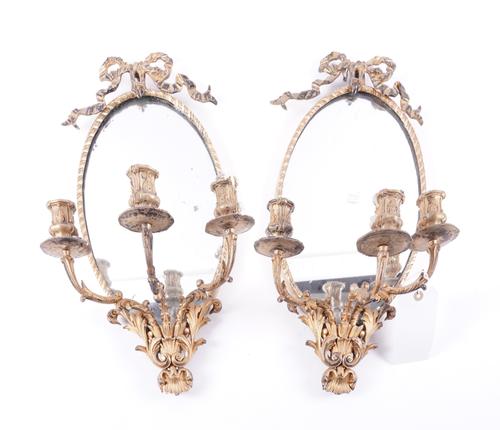 A PAIR OF LOUIS XVI STYLE GILT-METAL THREE LIGHT WALL LIGHTS OR GIRANDOLES (2)
