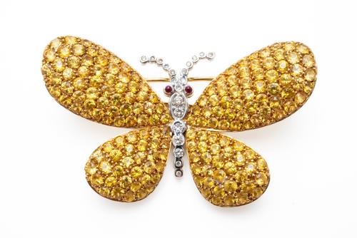 A YELLOW SAPPHIRE AND DIAMOND BUTTERFLY BROOCH
