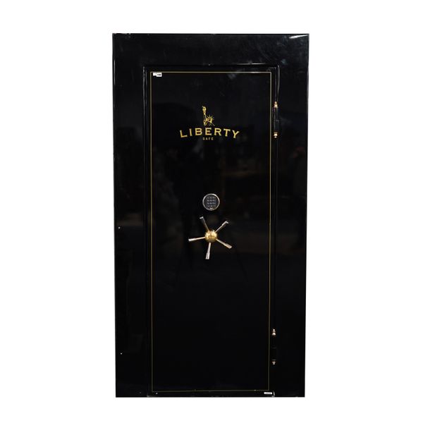 LIBERTY; A BLACK PAINTED GOLD HIGHLIGHTED SAFE/STRONGROOM DOOR