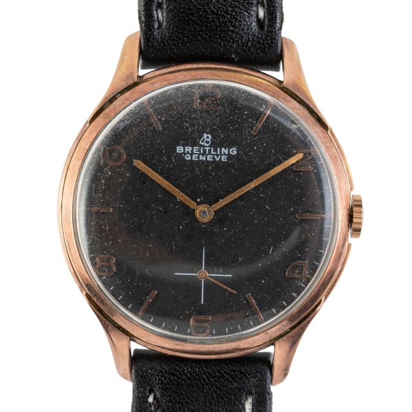 A BREITLING CADETTE BLACK DIAL AND PLATED ROSE GOLD CASE