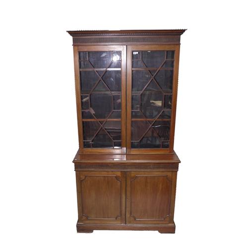 A LATE VICTORIAN MAHOGANY BOOKCASE CABINET