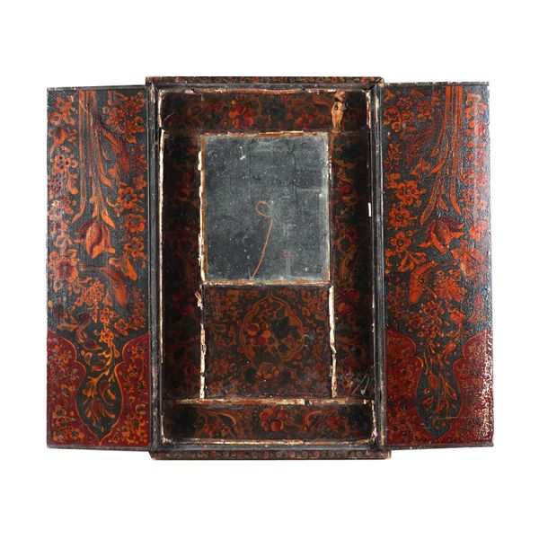 A SOUTH-WEST ASIAN POLCHROME WALL MIRROR