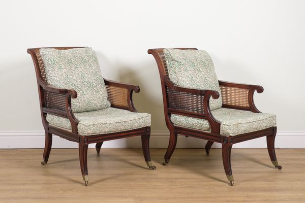 WILLIAM L MACLEAN; A PAIR OF REGENCY STYLE MAHOGANY FRAMED BERGERE CHAIRS (2)