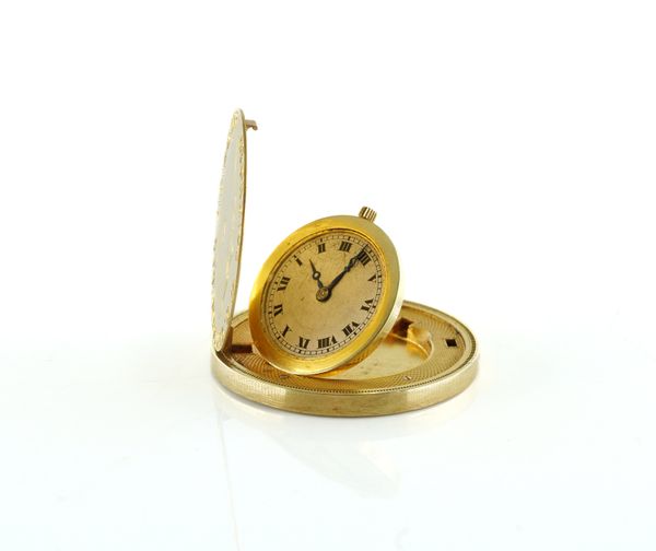 A GOLD CASED PURSE WATCH