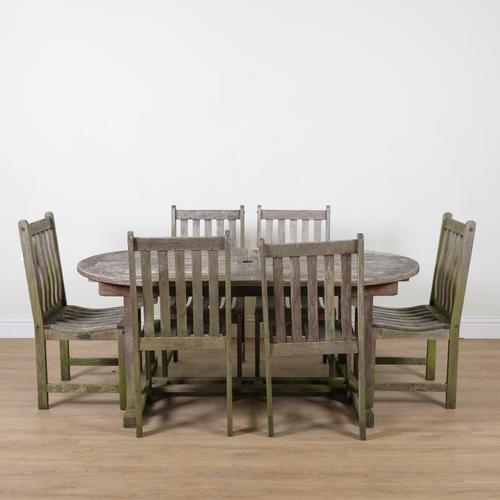 WESTMINSTER TEAK; A TEAK OVAL GARDEN TABLE (7)
