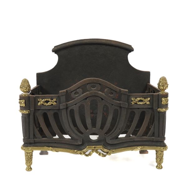 A GEORGE III STYLE GILT-BRASS MOUNTED CAST IRON FIRE BASKET OR GRATE