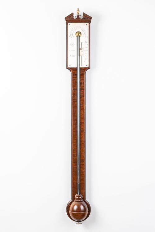 A GEORGE III MAHOGANY STICK BAROMETER