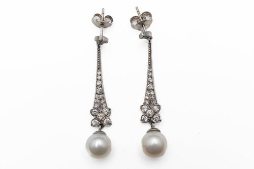 A PAIR OF DIAMOND AND PEARL DROP EARRINGS (3)