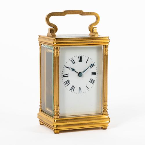 A FRENCH BRASS CARRIAGE TIMEPIECE