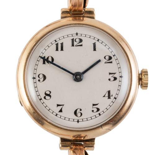 AN EDWARDIAN 9CT GOLD LADY'S WATCH