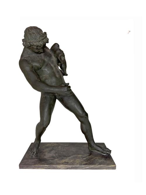 OF GRAND TOUR INTEREST: AN ITALIAN BRONZE OF A FAUN WITH A WINE SACK AFTER THE ANTIQUE