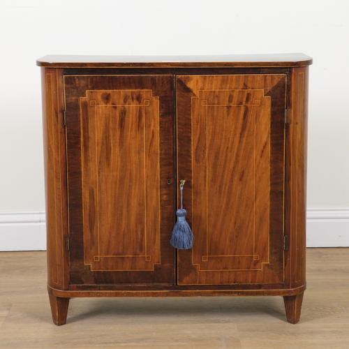 AN EARLY 19TH CENTURY INLAID MAHOGANY BOWFRONT TWO DOOR SIDE CABINET