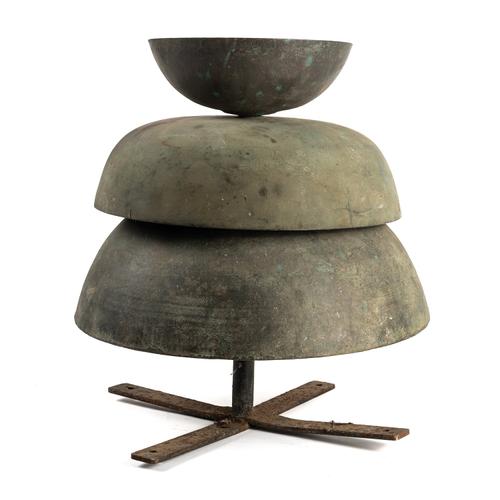 A WROUGHT-IRON STAND WITH THREE GRADUATED BELLS