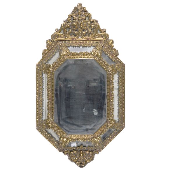 A DUTCH REPOUSSE BRASS MARGINAL MIRROR