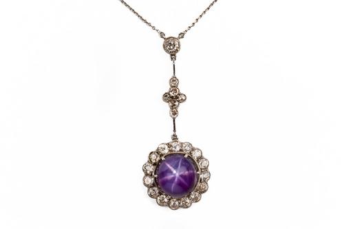 A STAR SAPPHIRE AND DIAMOND PENDANT NECKLACE (2)