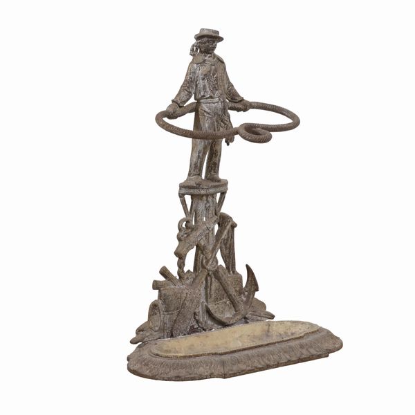 MARITIME INTEREST: A FRENCH CAST-IRON STICK/UMBRELLA STICK STAND MODELLED AS A SAILOR