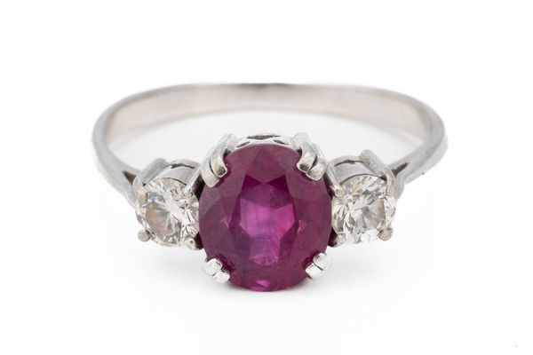 A RUBY AND DIAMOND THREE STONE RING