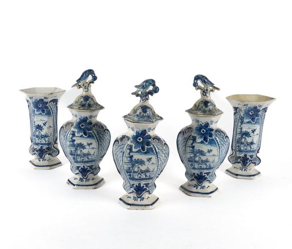 A DUTCH DELFT GARNITURE OF FIVE BLUE AND WHITE VASES (8)