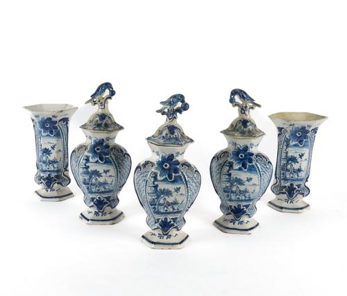A DUTCH DELFT GARNITURE OF FIVE BLUE AND WHITE VASES (8)