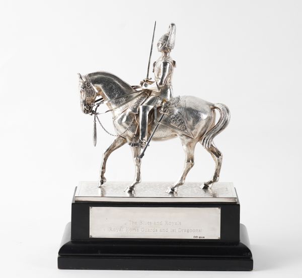 A SILVER MODEL OF A MOUNTED OFFICER OF THE HOUSEHOLD CAVALRY