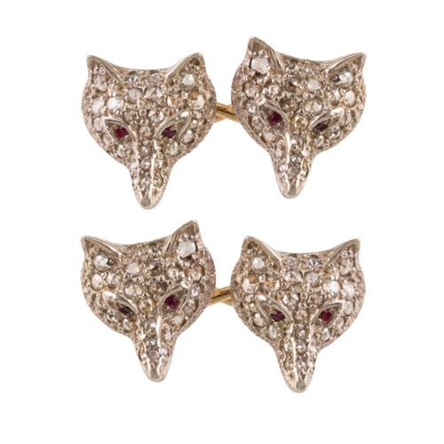 A PAIR OF DIAMOND AND RUBY FOX CUFFLINKS