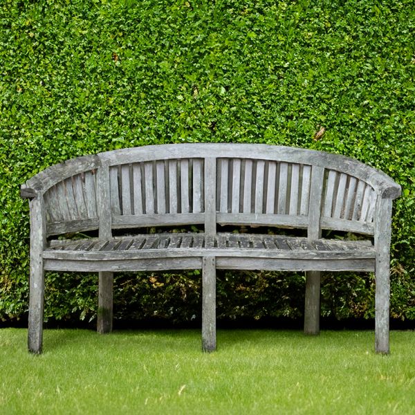 A HARDWOOD SEMI-ELLIPTIC GARDEN BENCH (2)