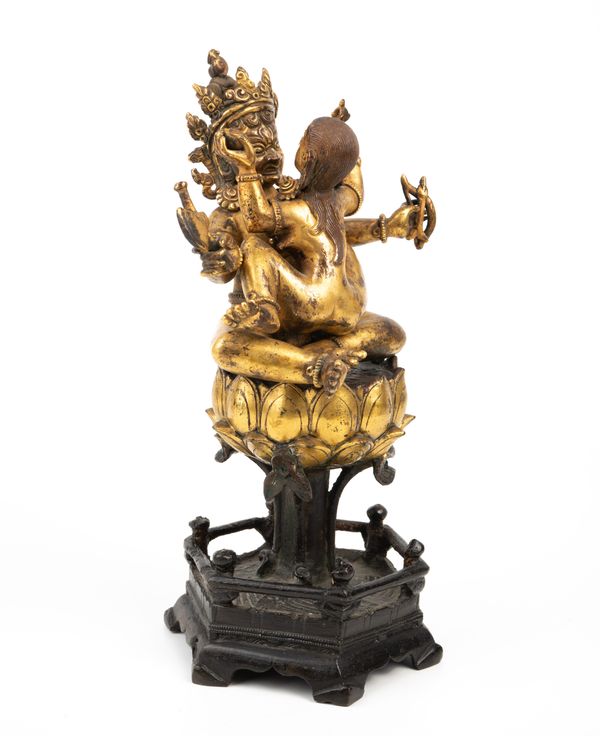 A NEPALESE GILT-BRONZE TANTRIC GROUP OF BUDDHA SITASAMVARA IN YAB-YUM