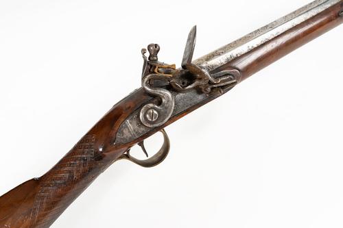 A FLINTLOCK LONG GUN