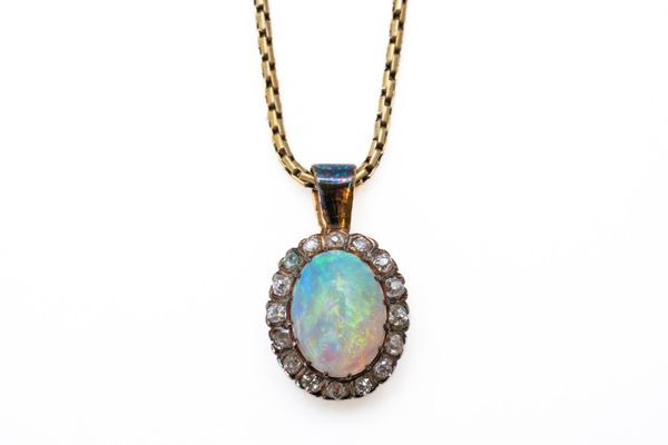 AN OPAL AND DIAMOND PENDANT NECKLACE