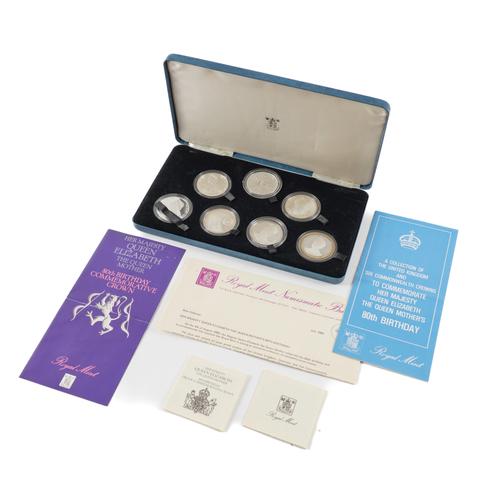 A SET OF SEVEN SILVER PROOF CROWN SIZED COINS