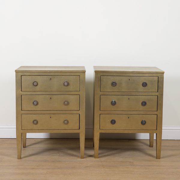 JULIAN CHICHESTER; A PAIR OF GOLD PAINTED THREE DRAWER BEDSIDE CHESTS (2)