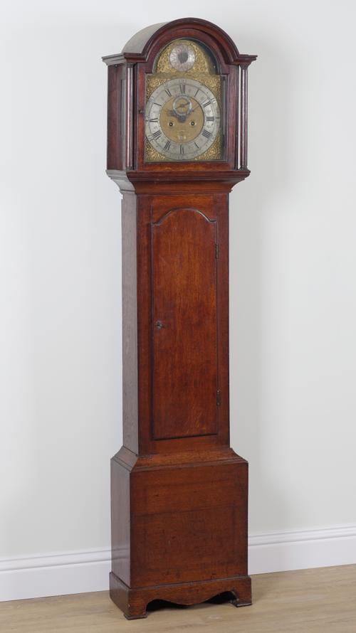 A GEORGIAN OAK LONGCASE CLOCK