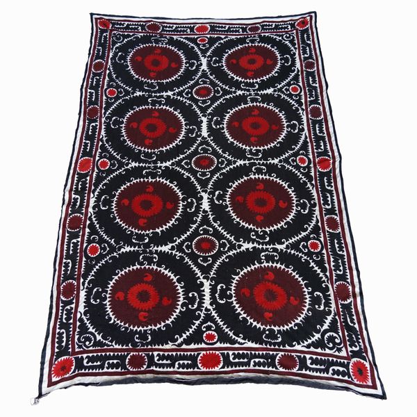 A LARGE MEDALLION TYPE SUSANI WALL HANGING