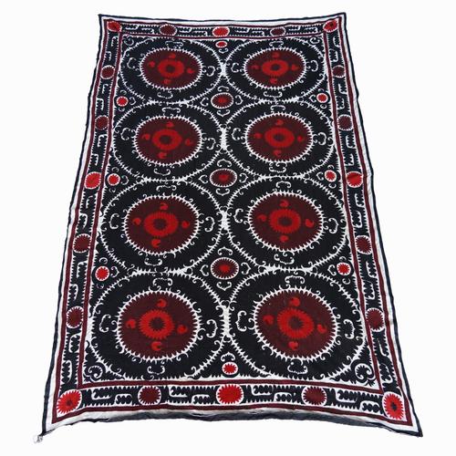 A LARGE MEDALLION TYPE SUSANI WALL HANGING
