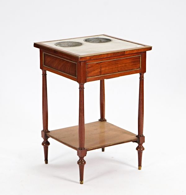 A late 18th century Directoire brass-mounted mahogany ''Table de Raffraischoir'', the inset Carrara marble top with two brass cylindrical wine...