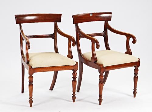 A pair of early Victorian mahogany open armchairs, on turned supports, 52cm wide x 88cm high, (2).