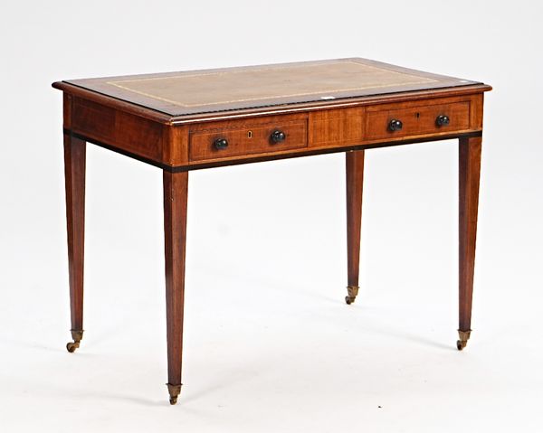 A late Victorian mahogany and figured walnut writing table with a pair of frieze drawers on tapering square supports, 100cm wide x  75cm high.