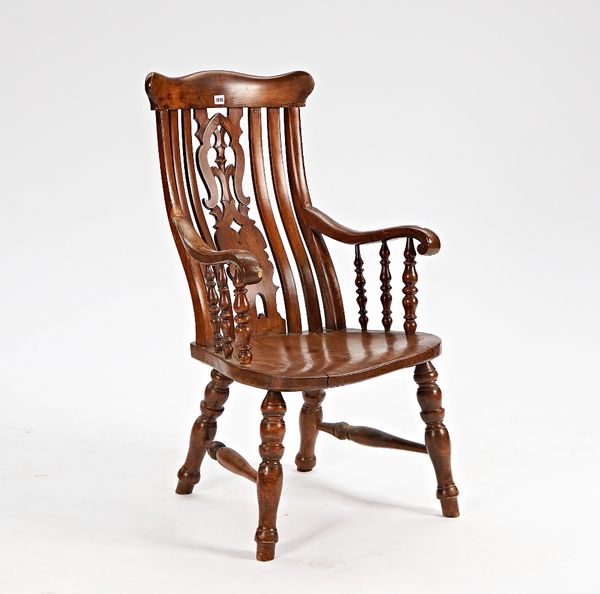 A 19th century elm kitchen/Windsor style chair with pierced splat on turned supports, 55cm wide x 104cm high.