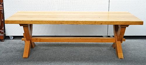A modern oak kitchen table of 17th century design with a plank top on pegged frame base, 101cm wide x 2540cm long, the top is 7cm thick.